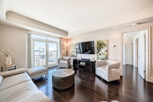 404-211 Quarry Way Se, Calgary, AB - Indoor Photo Showing Living Room