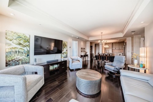 404-211 Quarry Way Se, Calgary, AB - Indoor Photo Showing Living Room