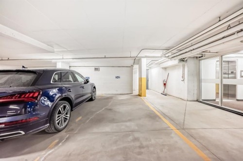 404-211 Quarry Way Se, Calgary, AB - Indoor Photo Showing Garage