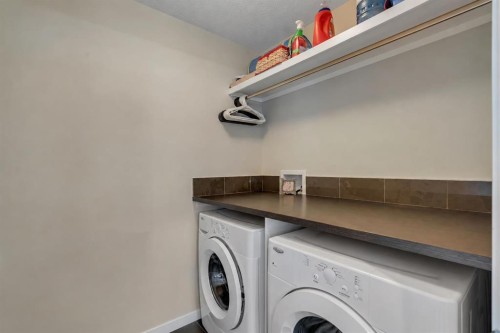 2280 Mahogany Boulevard Se, Calgary, AB - Indoor Photo Showing Laundry Room