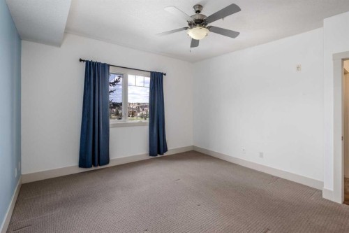 213-77 George Fox Trail West, Cochrane, AB - Indoor Photo Showing Other Room