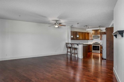 213-77 George Fox Trail West, Cochrane, AB - Indoor Photo Showing Kitchen