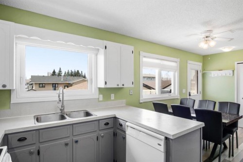 5626 57 Avenue, Olds, AB - Indoor Photo Showing Kitchen With Double Sink