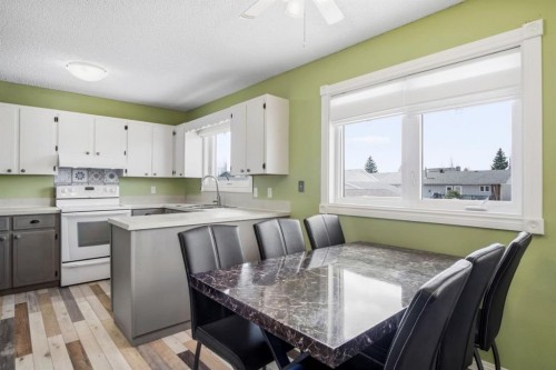 5626 57 Avenue, Olds, AB - Indoor Photo Showing Kitchen With Double Sink