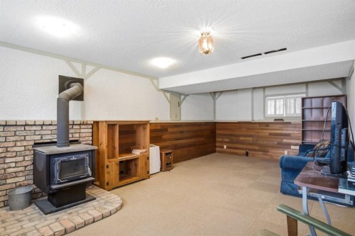 5626 57 Avenue, Olds, AB - Indoor With Fireplace