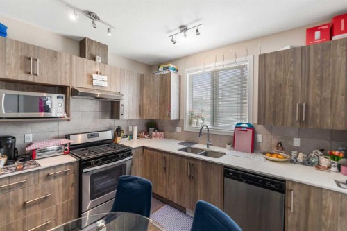 26 Redstone Way Ne, Calgary, AB - Indoor Photo Showing Kitchen With Double Sink