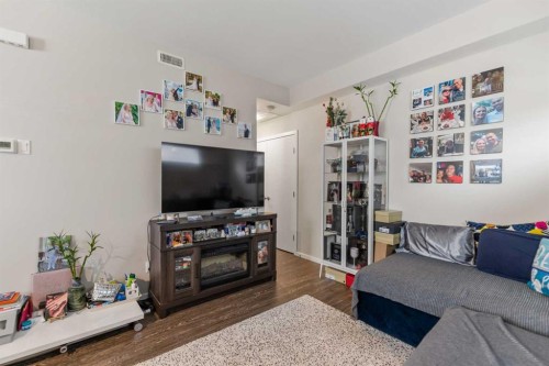 26 Redstone Way Ne, Calgary, AB - Indoor Photo Showing Living Room