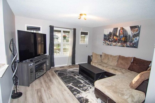 48 Skyview Ranch Lane Ne, Calgary, AB - Indoor Photo Showing Living Room With Fireplace