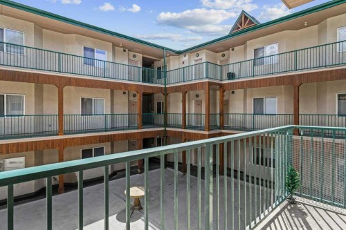 211-176 Kananaskis Way, Canmore, AB - Outdoor With Balcony With Exterior