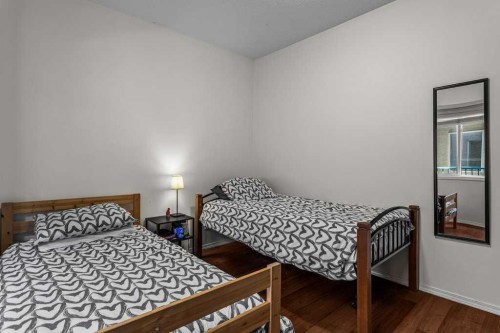 211-176 Kananaskis Way, Canmore, AB - Indoor Photo Showing Bedroom