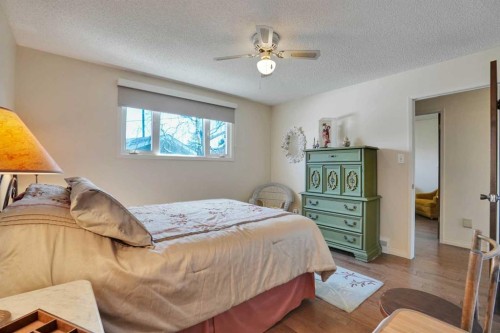 228 Dovercrest Place Se, Calgary, AB - Indoor Photo Showing Bedroom