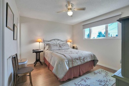 228 Dovercrest Place Se, Calgary, AB - Indoor Photo Showing Bedroom
