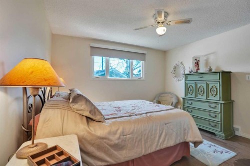 228 Dovercrest Place Se, Calgary, AB - Indoor Photo Showing Bedroom