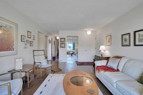 228 Dovercrest Place Se, Calgary, AB - Indoor Photo Showing Living Room