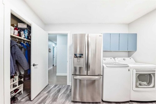 7 Sunset Crescent, Okotoks, AB - Indoor Photo Showing Laundry Room