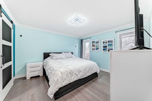 7 Sunset Crescent, Okotoks, AB - Indoor Photo Showing Bedroom