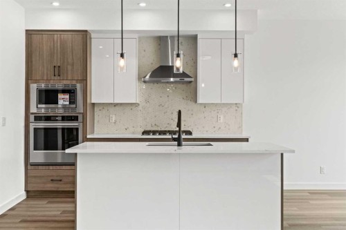 134-2231 81 Street Sw, Calgary, AB - Indoor Photo Showing Kitchen With Upgraded Kitchen