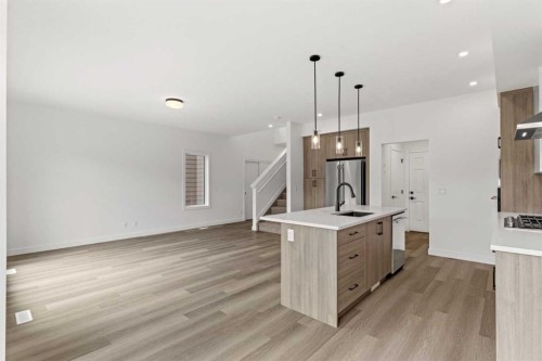 134-2231 81 Street Sw, Calgary, AB - Indoor Photo Showing Kitchen With Upgraded Kitchen
