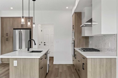 134-2231 81 Street Sw, Calgary, AB - Indoor Photo Showing Kitchen With Upgraded Kitchen
