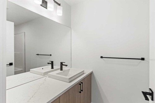 134-2231 81 Street Sw, Calgary, AB - Indoor Photo Showing Laundry Room