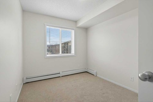 2209-81 Legacy Boulevard Se, Calgary, AB - Indoor Photo Showing Other Room