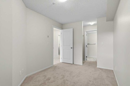 2209-81 Legacy Boulevard Se, Calgary, AB - Indoor Photo Showing Other Room