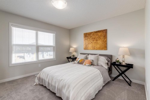 44 Tillotson Loop, Okotoks, AB - Indoor Photo Showing Bedroom