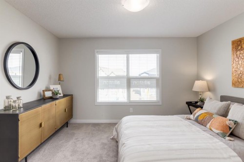 44 Tillotson Loop, Okotoks, AB - Indoor Photo Showing Bedroom