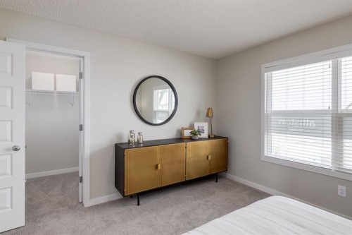 44 Tillotson Loop, Okotoks, AB - Indoor Photo Showing Bedroom