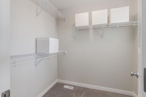 44 Tillotson Loop, Okotoks, AB - Indoor With Storage
