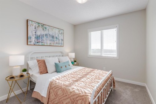 44 Tillotson Loop, Okotoks, AB - Indoor Photo Showing Bedroom