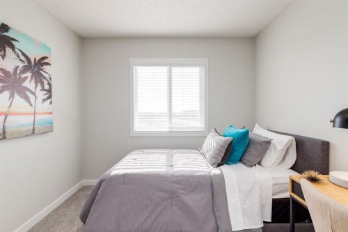 44 Tillotson Loop, Okotoks, AB - Indoor Photo Showing Bedroom