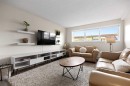 215-101 Big Hill Way Se, Airdrie, AB  - Indoor Photo Showing Living Room 