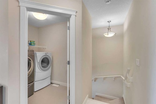 133 Redstone Common Ne, Calgary, AB - Indoor Photo Showing Laundry Room