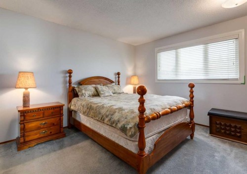 223 Cedarwood Road Sw, Calgary, AB - Indoor Photo Showing Bedroom