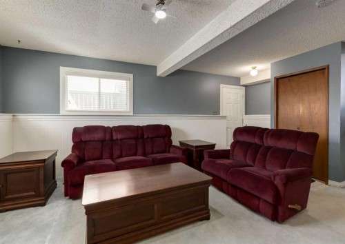 223 Cedarwood Road Sw, Calgary, AB - Indoor Photo Showing Living Room