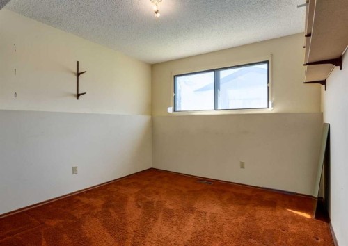 223 Cedarwood Road Sw, Calgary, AB - Indoor Photo Showing Other Room