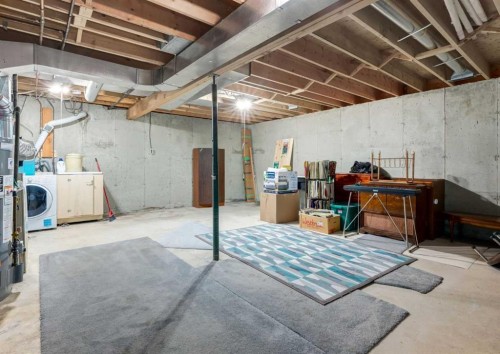 223 Cedarwood Road Sw, Calgary, AB - Indoor Photo Showing Basement