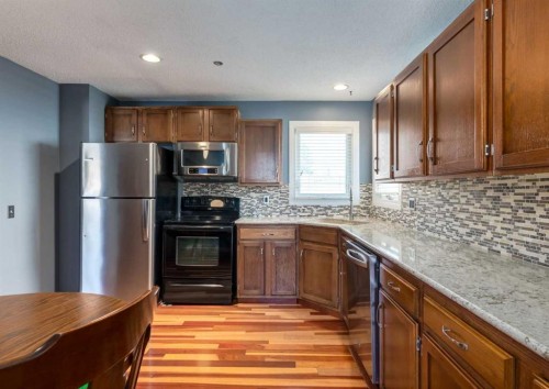 223 Cedarwood Road Sw, Calgary, AB - Indoor Photo Showing Kitchen