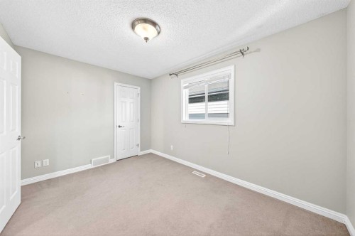 21 Panamount Street Nw, Calgary, AB - Indoor Photo Showing Other Room