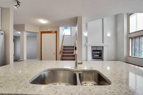 50 Cranfield Crescent Se, Calgary, AB - Indoor Photo Showing Kitchen With Double Sink