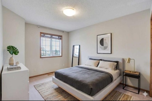 50 Cranfield Crescent Se, Calgary, AB - Indoor Photo Showing Bedroom