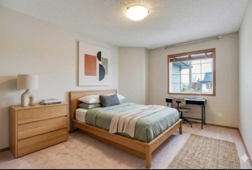 50 Cranfield Crescent Se, Calgary, AB - Indoor Photo Showing Bedroom