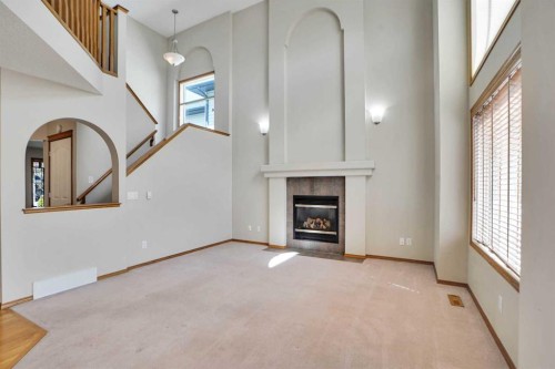 50 Cranfield Crescent Se, Calgary, AB - Indoor With Fireplace