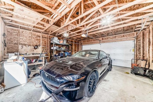 29 Midgrove Lane Sw, Airdrie, AB - Indoor Photo Showing Garage