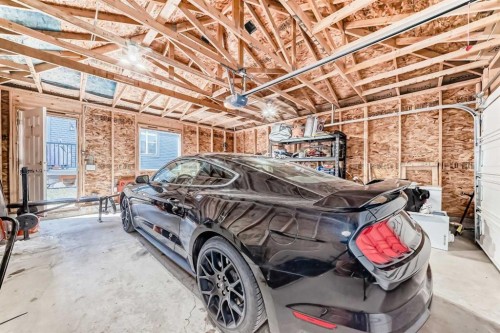 29 Midgrove Lane Sw, Airdrie, AB - Indoor Photo Showing Garage