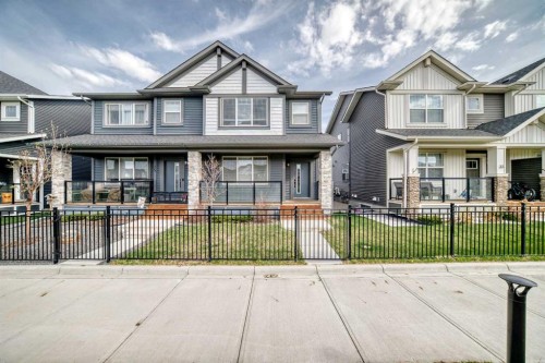 29 Midgrove Lane Sw, Airdrie, AB - Outdoor With Deck Patio Veranda With Facade