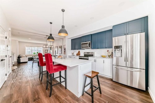 29 Midgrove Lane Sw, Airdrie, AB - Indoor Photo Showing Kitchen With Stainless Steel Kitchen With Upgraded Kitchen