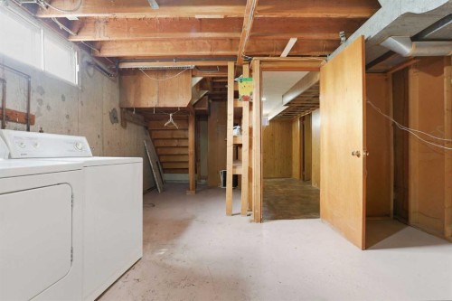 140 Fyffe Road Se, Calgary, AB - Indoor Photo Showing Laundry Room
