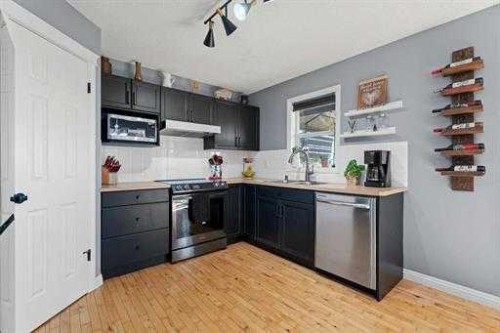 529 Railway Avenue, Langdon, AB - Indoor Photo Showing Kitchen With Stainless Steel Kitchen